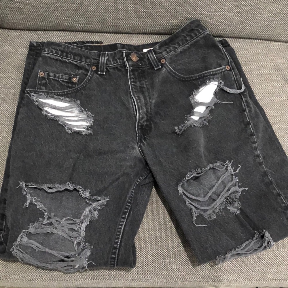 Vintage custom distressed Levi’s 560 loose fit tapered leg in black